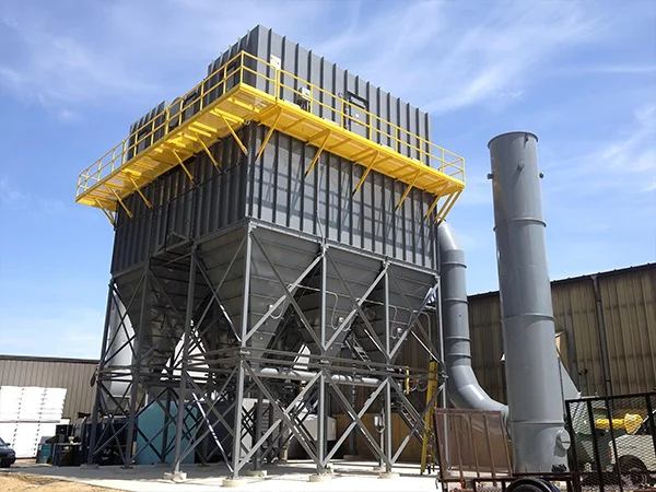 A large baghouse dust collector installed outdoors