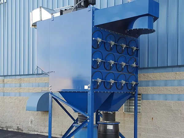 A cartridge dust collector installed on the ground