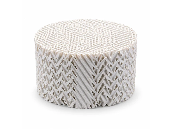 A piece of Ceramic Structured Packing placed on a flat surface