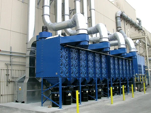 Several cartridge dust collectors installed in series