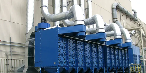 Several cartridge dust collectors installed in series