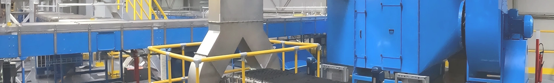 An oil mist purifier connected to ducts and equipment