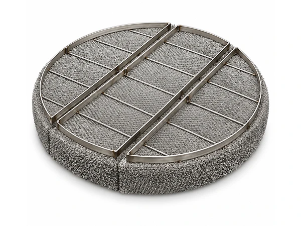 A wire mesh demister pad is placed there.