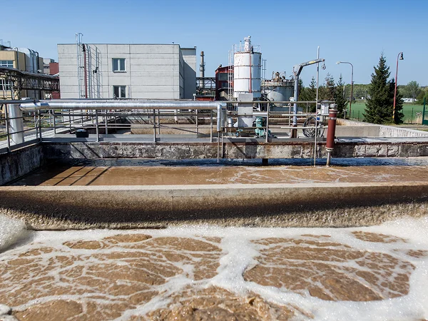 Large volumes of wastewater being treated at a wastewater treatment plant.